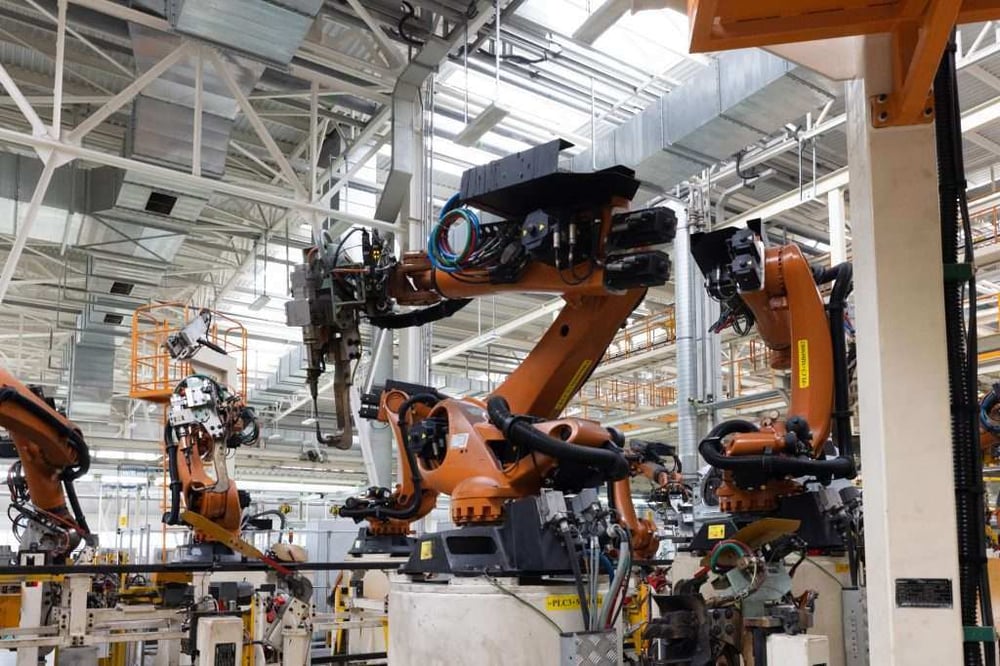 photo-automobile-production-line-welding-car-body-modern-car-assembly-plant-auto-industry-1024x683